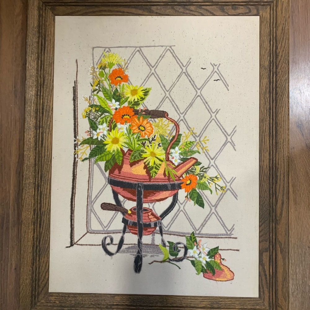 Vintage crewel floral photo in frame